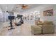 Home gym with exercise equipment, built-in shelves, and neutral colored carpet at 7815 Bamby Rd, Cumming, GA 30041