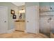 Elegant bathroom with glass-enclosed shower, vanity, and tiled floors at 7815 Bamby Rd, Cumming, GA 30041