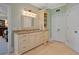 Beautiful bathroom vanity with granite countertops and elegant lighting at 7815 Bamby Rd, Cumming, GA 30041