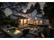 Stunning backyard oasis with a sparkling pool, spa, and lush landscaping, perfect for outdoor entertaining at 820 Highland Ne Ter, Atlanta, GA 30306