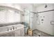 Elegant bathroom with a soaking tub and a separate glass-enclosed shower at 820 Highland Ne Ter, Atlanta, GA 30306