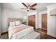 Bedroom with neutral decor, wood flooring, and a ceiling fan at 820 Highland Ne Ter, Atlanta, GA 30306
