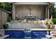 Picturesque cabana area with outdoor seating, dining, and ambient lighting, near pool at 820 Highland Ne Ter, Atlanta, GA 30306