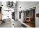 Charming courtyard features seating, lighting, and access to the dining room and a spiral staircase at 820 Highland Ne Ter, Atlanta, GA 30306