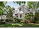 Beautiful home with a manicured lawn and mature trees at 820 Highland Ne Ter, Atlanta, GA 30306