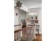 Hallway with staircase, artwork, and stained glass window at 820 Highland Ne Ter, Atlanta, GA 30306