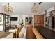 Open living room and kitchen, showcasing modern design, comfortable seating, and stainless steel appliances at 820 Highland Ne Ter, Atlanta, GA 30306