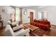 Bright and inviting living room with hardwood floors, modern decor, and comfortable seating at 820 Highland Ne Ter, Atlanta, GA 30306