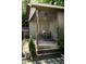 Covered outdoor dining area with a table, chairs, and decorative lighting at 820 Highland Ne Ter, Atlanta, GA 30306