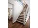 Beautiful staircase with stained wood steps, white risers and railings leading to the second floor at 820 Highland Ne Ter, Atlanta, GA 30306