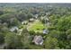 Residential neighborhood aerial view featuring well-maintained lawns, mature trees, and varied home styles at 117 Laguna Springs Dr, Woodstock, GA 30188