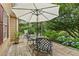 Outdoor back deck with table, chairs and shade for entertaining at 117 Laguna Springs Dr, Woodstock, GA 30188