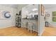 Breakfast nook area with bar seating opening to the kitchen at 117 Laguna Springs Dr, Woodstock, GA 30188