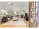 Bright living room with vaulted ceiling, fireplace, and hardwood floors at 117 Laguna Springs Dr, Woodstock, GA 30188