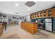 Basement kitchen area featuring a bar, sink, cabinetry, and modern appliances at 117 Willow View Ln, Canton, GA 30114