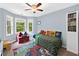Fun bedroom with blue walls and a Spiderman-themed rug at 117 Willow View Ln, Canton, GA 30114