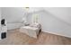 Attic bedroom with twin bed, plush pillows, and carpeted floors at 117 Willow View Ln, Canton, GA 30114