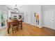 View of the kitchen and dining area with the laundry area on the right at 117 Willow View Ln, Canton, GA 30114