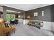 Open-concept living room with a piano and dining room at 117 Willow View Ln, Canton, GA 30114