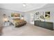 Serene main bedroom featuring a tray ceiling at 117 Willow View Ln, Canton, GA 30114