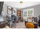 Comfortable home office with large window, desk setup, and cozy leather chair at 117 Willow View Ln, Canton, GA 30114