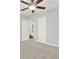 Spacious bedroom featuring neutral carpet and a ceiling fan at 2505 Mellville Ave, Decatur, GA 30032
