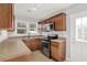 Well-equipped kitchen with stainless steel appliances, neutral countertops, and ample cabinet space at 2505 Mellville Ave, Decatur, GA 30032