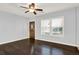 Bright living room showcases beautiful hardwood floors and a classic paneled door at 2505 Mellville Ave, Decatur, GA 30032