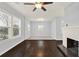Bright living room with hardwood flooring, fireplace, and great natural light at 2505 Mellville Ave, Decatur, GA 30032