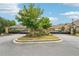 Stone entrance to Westbrook Village with gated access and manicured landscaping at 332 Rosshandler Rd, Suwanee, GA 30024