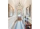 Inviting hallway with hardwood floors and elegant decor at 332 Rosshandler Rd, Suwanee, GA 30024