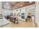 Spacious kitchen with white cabinets, stainless steel appliances, and an island with granite countertops at 332 Rosshandler Rd, Suwanee, GA 30024