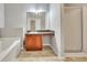 Bathroom features a soaking tub, glass-enclosed shower, and single vanity at 4713 Liberty Square Dr, Acworth, GA 30101