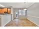 Dining area with tile flooring, stylish lighting, and easy access to the kitchen at 4713 Liberty Square Dr, Acworth, GA 30101