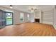 Bright living room with hardwood floors, fireplace, and built-in shelving at 4713 Liberty Square Dr, Acworth, GA 30101