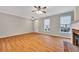 Inviting living room with hardwood floors, a fireplace, and natural light at 4713 Liberty Square Dr, Acworth, GA 30101