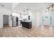 Bright kitchen with stainless steel appliances and a center island at 5745 Westwood Dr, Cumming, GA 30040