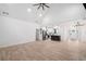 Spacious living room and kitchen with stainless steel appliances at 5745 Westwood Dr, Cumming, GA 30040