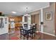 Charming dining area featuring a dining table and an open layout at 1003 Dunedin Trl, Woodstock, GA 30188