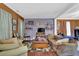 Inviting living room with hardwood floors, colorful walls, and ample natural light at 1003 Dunedin Trl, Woodstock, GA 30188