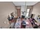 High angle view of the living room with fireplace and open dining and kitchen area at 1003 Dunedin Trl, Woodstock, GA 30188