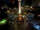 Cozy backyard seating area with ambient lighting, perfect for evening relaxation at 106 Cessna Dr, Canton, GA 30114