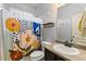 A bathroom showcasing a decorative shower curtain, sink, and vanity at 106 Cessna Dr, Canton, GA 30114