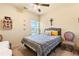 Cozy bedroom with ceiling fan, bright window and decorative accents for relaxing and sleep at 106 Cessna Dr, Canton, GA 30114