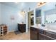 Bright main bathroom with dual vanities, walk-in closet and separate shower and tub at 106 Cessna Dr, Canton, GA 30114