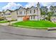 View of gray house with green lawn at 2535 Brookgate Xing, Ellenwood, GA 30294