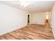 Finished basement area with wood-look floors and white trim and doorways at 403 Hidden Hills Ct, Canton, GA 30115