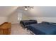 Upstairs bedroom with vaulted ceiling features ceiling fan and two twin beds at 403 Hidden Hills Ct, Canton, GA 30115