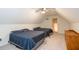 Spacious bedroom featuring two twin beds and a ceiling fan at 403 Hidden Hills Ct, Canton, GA 30115
