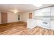 Bright kitchen featuring white cabinetry, granite countertops, and modern appliances at 403 Hidden Hills Ct, Canton, GA 30115